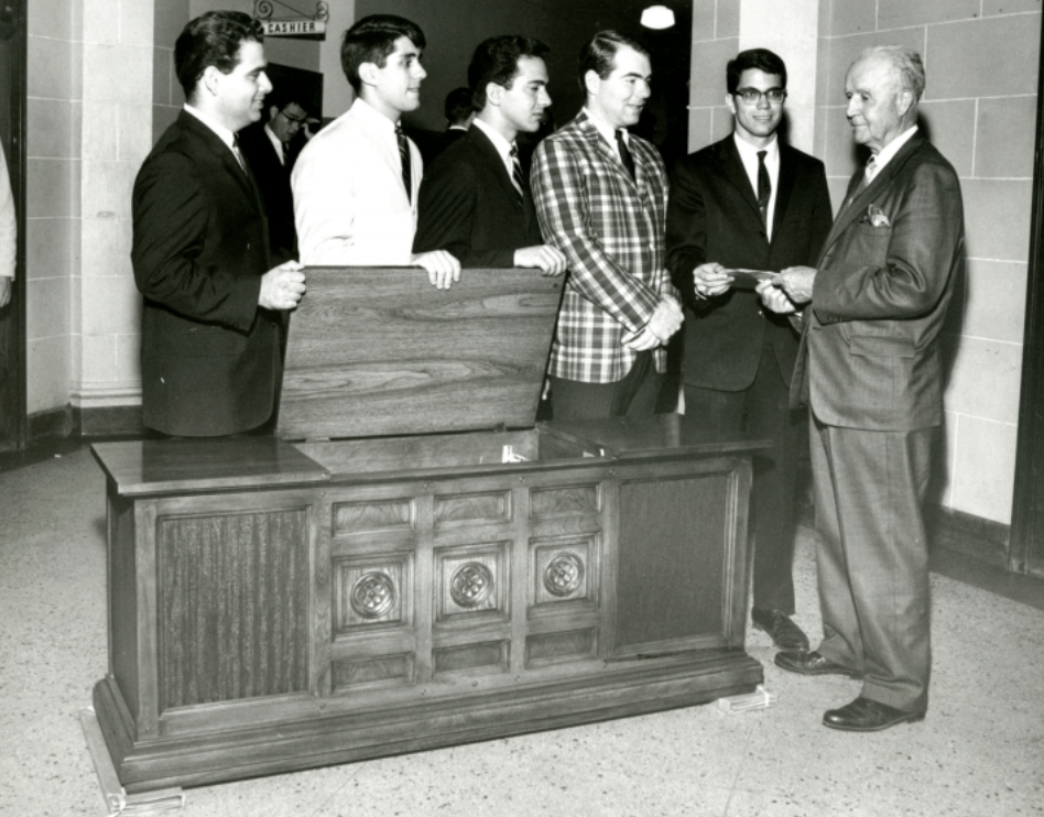 Dr. Howard W. Jones receiving a gift from Student Council